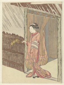 Ragazza con un ramo di yamabuki in mano