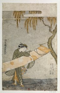 Giovane donna che cura un kakemono attaccato a un albero da Suzuki Harunobu