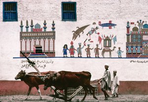 Murale dipinto su muro di stucco di una fattoria a Luxor commemora l