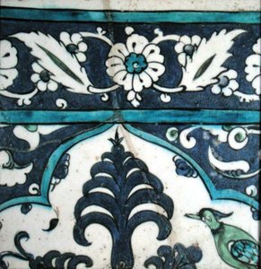 Piastrella di Isnik con disegno floreale e bordo