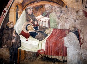 La morte di Santa Scolastica (v. 480-v. 543), sorella di San Benedetto da Norcia. È circondata da monaci benedettini. Affresco della scuola umbra del XV secolo. Monastero di San Benedetto (Sacro Speco), Subiaco (Roma), Italia