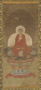 Buddha in trono su un tappeto di erba Kusa