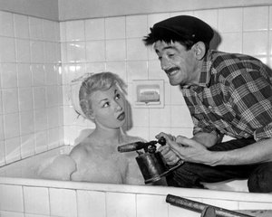 Nadine Tallier (diventata Baronne Nadine De Rothschild) e Maurice Gardett durante la serata a casa sua a Parigi il 27 marzo 1961 da Unbekannt Unbekannt