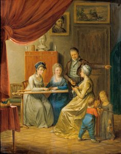Famiglia con due donne al telaio da ricamo