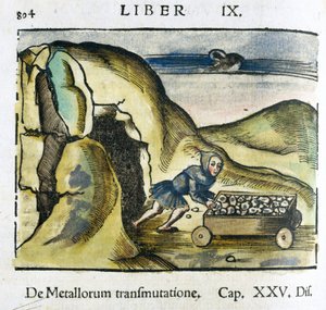 La miniera nel XVI secolo: un uomo spinge un carrello pieno di minerale all