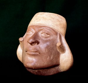 Vaso in terracotta rappresentante una testa d