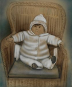 Bambino in sedia