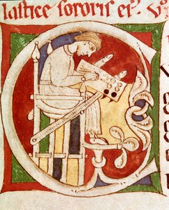 Lettera C adornata con un monaco che scrive su una scrivania. Miniatura da "Vita dei santi" 12° secolo Coimbra, biblioteca universitaria