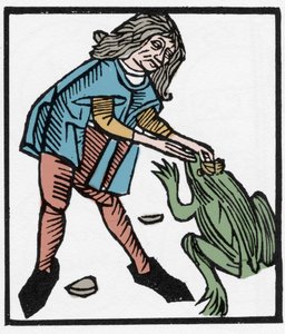 Uomo che estrae la pietra del rospo per scopi magici - Maniere d