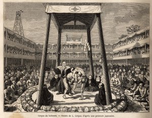 Il circo dei lottatori, che aspettano il loro turno per combattere, si svolge nell