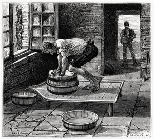 Lavoro del tomme da parte di un casaro dell