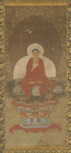 Buddha in trono su un tappeto di erba Kusa