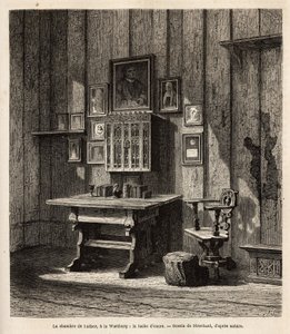 La stanza di Martin Lutero (1483-1546) a Wartburg dove si rifugiò dopo la sua scomunica nel 1521, con il suo ritratto e quelli dei suoi genitori sopra la scrivania, sotto i cui occhi tradusse la Bibbia in tedesco e rediò i suoi testi più famosi. L