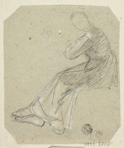 Donna seduta di profilo