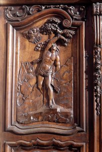 Il martirio di San Sebastiano, dettaglio della porta di legno scolpita della chiesa dell
