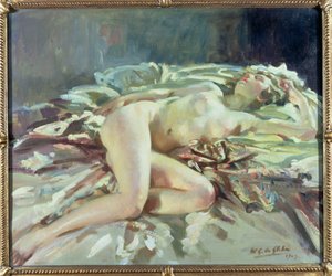 Nudo femminile reclinato su un letto