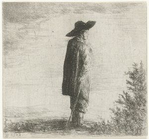 Uomo con cappello e bastone in un paesaggio