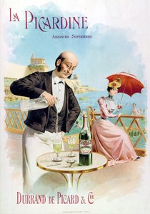 Un garzone di caffè prepara un bicchiere di assenzio
