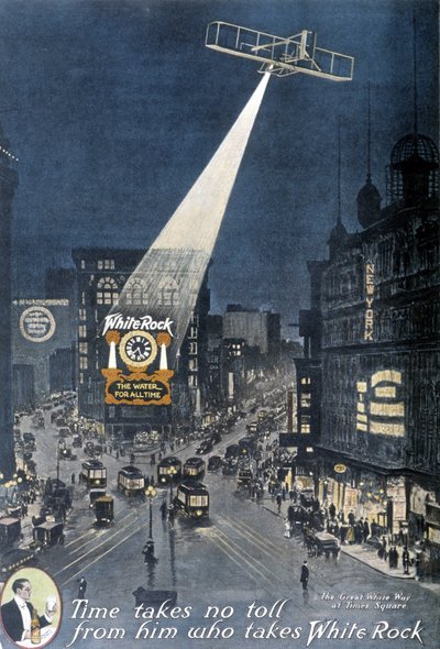 Pubblicità di alcolici "White Rock": Un aereo illumina il poster "White Rock" appeso su un edificio a Times Square a New York. 1912. da American School