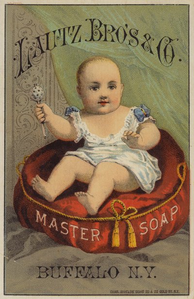 Bambino che scuote un sonaglio da American School