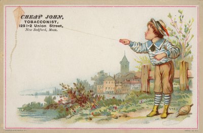 Ragazzo che fa volare un aquilone vicino al lago da American School
