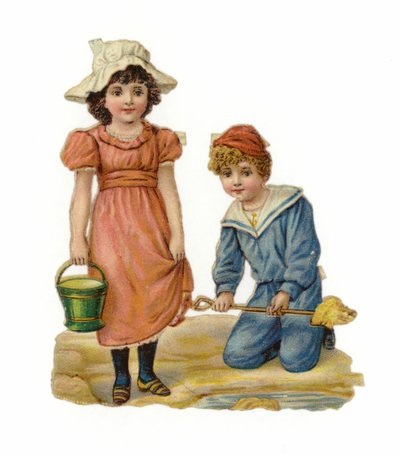 Ragazza e ragazzo che costruiscono castelli di sabbia da American School