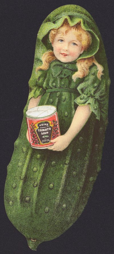 Ragazza vestita da cetriolo che tiene una lattina di Heinz Tomato Soup da American School