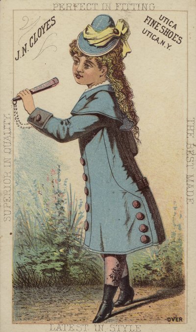 Ragazza con cappotto blu e stivali da American School