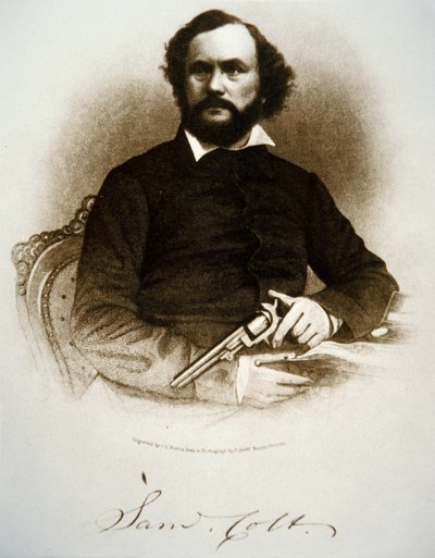 Samuel Colt con uno dei suoi revolver a percussione da American School