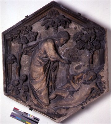 La creazione di Adamo, piastrella decorativa esagonale da una serie che illustra episodi della Genesi, probabilmente basata su disegni di Giotto c.1334-48 da Andrea Pisano