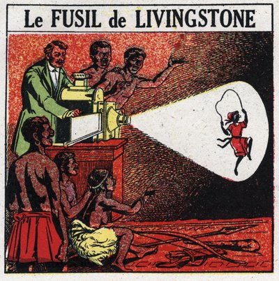 La proiezione: il fucile di Livingstone. David Livingstone (1813-1873) missionario ed esploratore scozzese con la lanterna magica nella tribù Balonda in Africa. Illustrazione anonima del 1925. Collezione privata. da Anonymous Anonymous