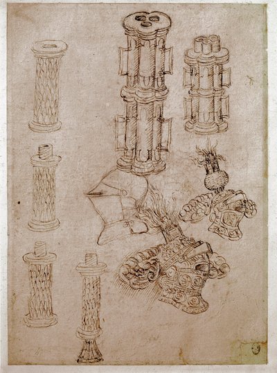 Tre elmi sormontati da creste e due pezzi di cannoni smontati da Antonio Pisanello