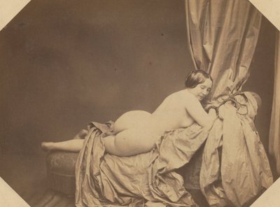 Nudo accademico, sdraiato su un divano, c. 1855 da Auguste Belloc
