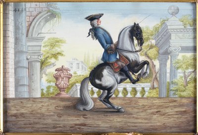 Un cavallo pezzato della Scuola di Equitazione Spagnola che esegue la Pesade da Baron Reis Eisenberg