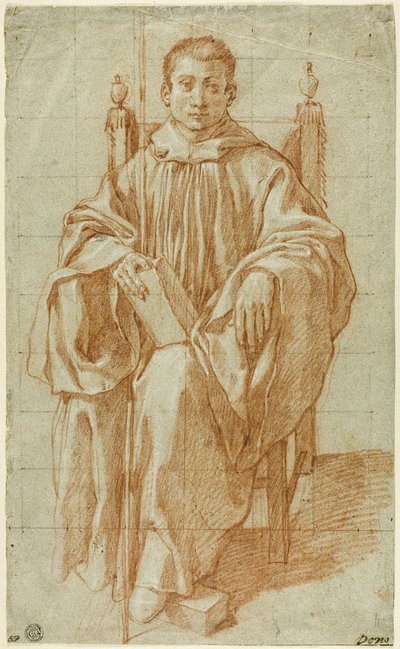 Giovane seduto con l