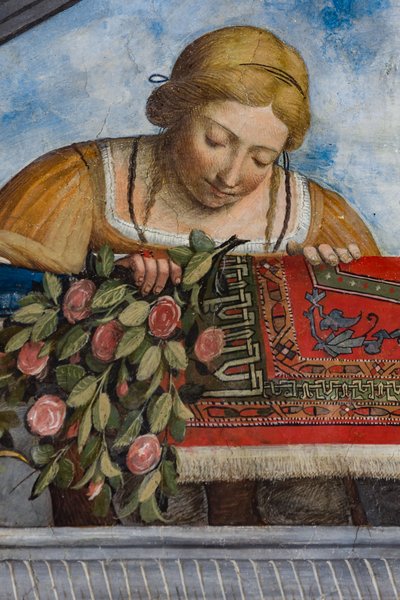 Donna con abito giallo e fiori (dettaglio) da Benvenuto Tisi da Garofalo