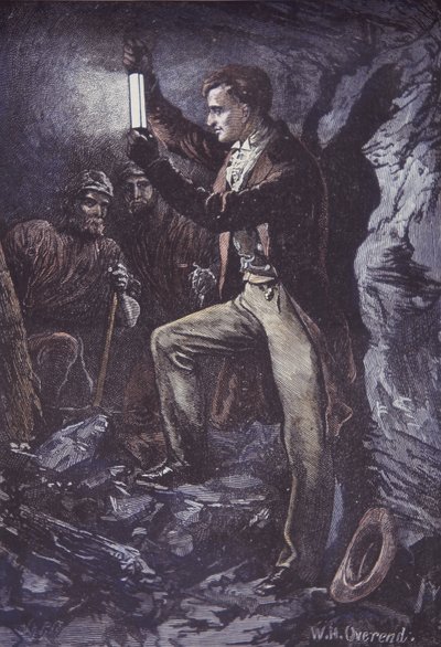 Humphry Davy con la lampada di sicurezza Davy per minatori, inventata nel 1815 (incisione su legno colorata a mano) da British School