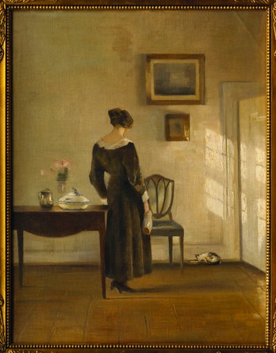 Un Interno con una Donna che Nutre un Gatto da Carl Holsoe