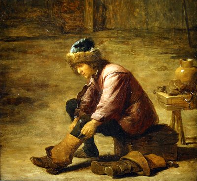 Un giovane che indossa uno stivale da David Teniers the Younger