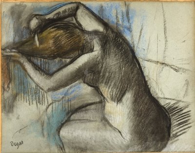 Donna nuda seduta che si pettina, c.1885 da Edgar Degas