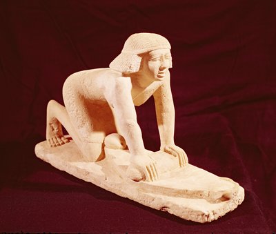 Modello di un servo che macina grano, Antico Regno, da Saqqara da Egyptian 5th Dynasty