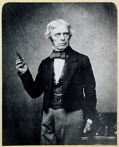 Michael Faraday (1791-1867) con un magnete a barra, di Maull e Polyblank da English Photographer