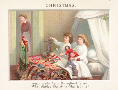 Bambini che svuotano le calze la mattina di Natale da English School