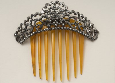 Pettine per capelli con testina incernierata (corno sintetico, acciaio e perline d