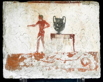 Arte etrusca: un giovane efebo nudo vicino a un tavolo dove è posto un vaso. Affresco della tomba del "tuffatore". Dal cimitero meridionale di Paestum. 480-470 a.C. da Etruscan