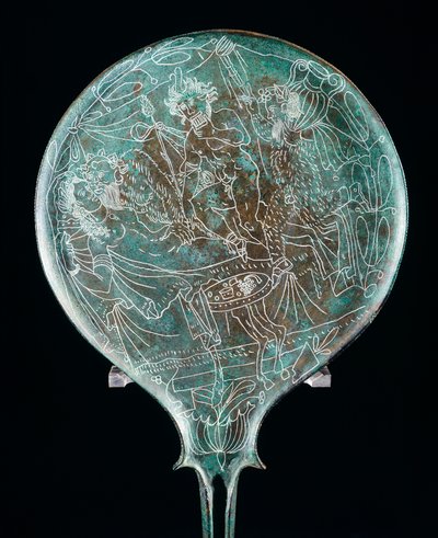 Specchio che raffigura scena di banchetto, manufatto in bronzo da Preneste (Lazio). Civiltà Etrusca, IV secolo a.C. da Etruscan