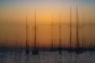 Barche a vela al tramonto sfocate da Franco Tessarolo