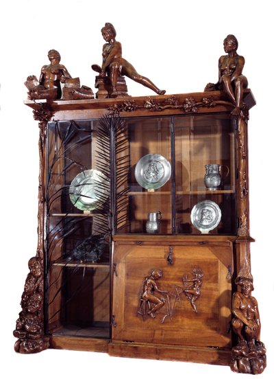 Mobile: libreria in noce e ferro battuto realizzata da Francois Hubert Carabin, 1890. Museo d