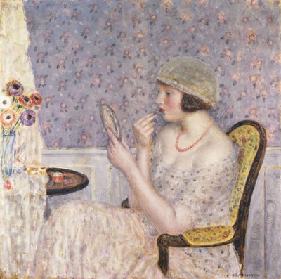 Donna al tavolo da toeletta da Frederick Carl Frieseke