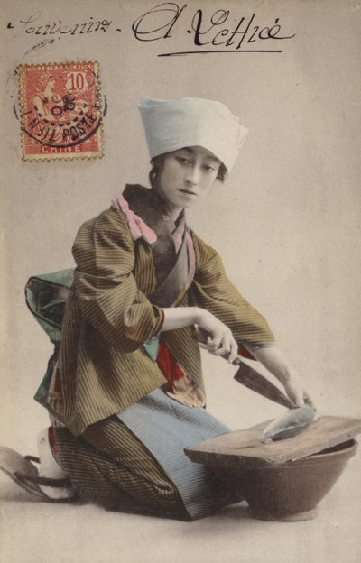 Ragazza giapponese che sfiletta il pesce da French Photographer